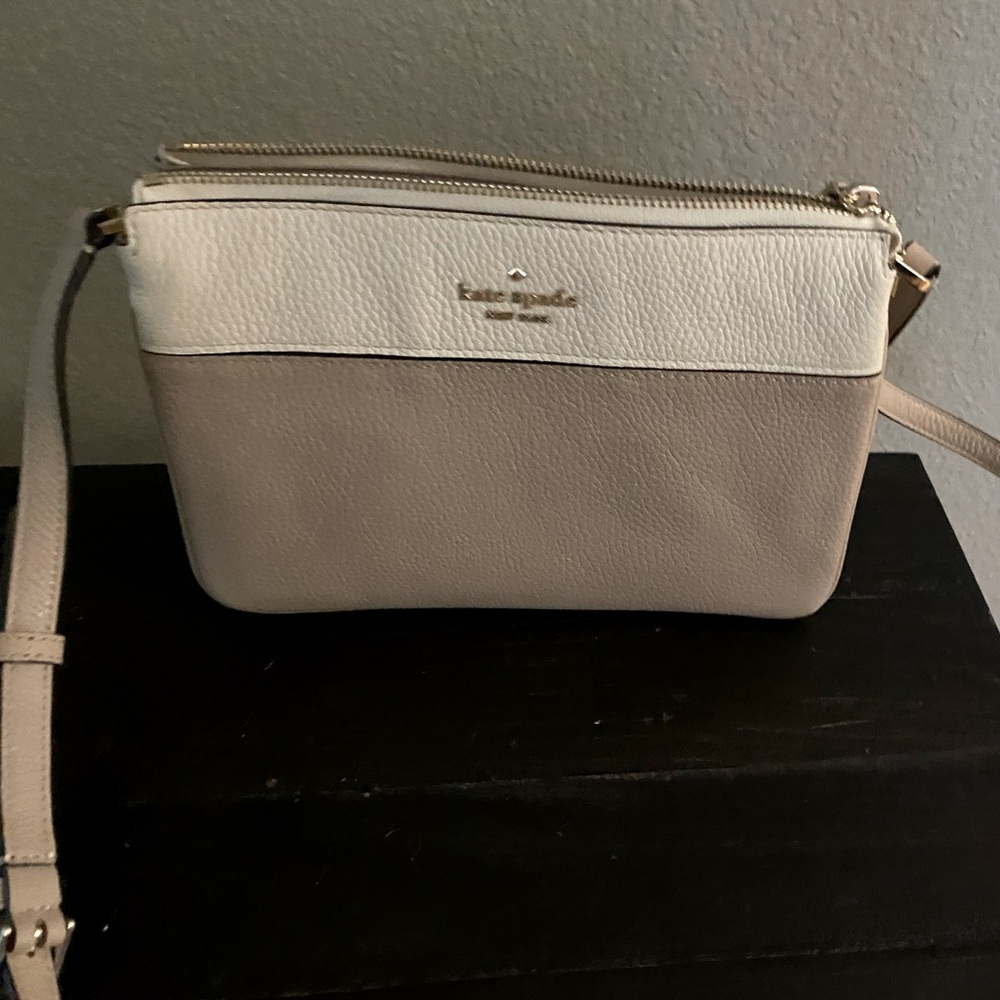 Kate Spade Handbag. 9” x 7”. Color: blush and cream.
